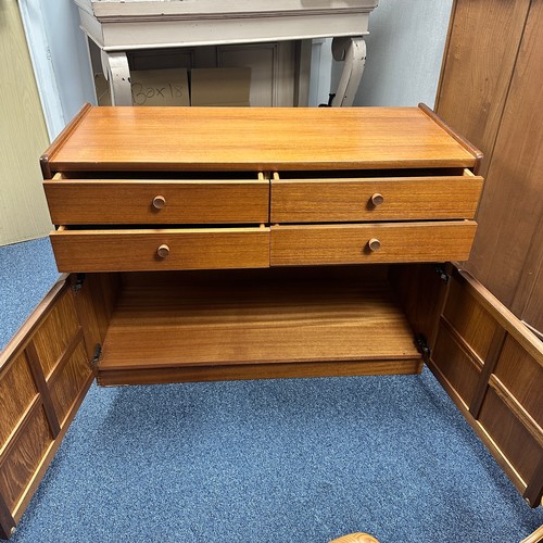 423 - Nathan - Squares Pattern - A retro 20th Century teak sideboard credenza. Having four drawers with a ... 