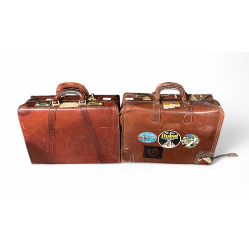 229 - Pair of Brown Leather Briefcases in varying condition.