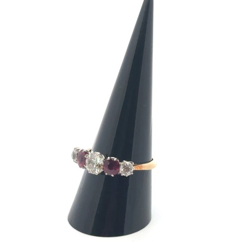 43 - An old cut diamond and ruby five stone ring, size R. 3.90g. Principal diamond 6.1mm, estimated appro... 