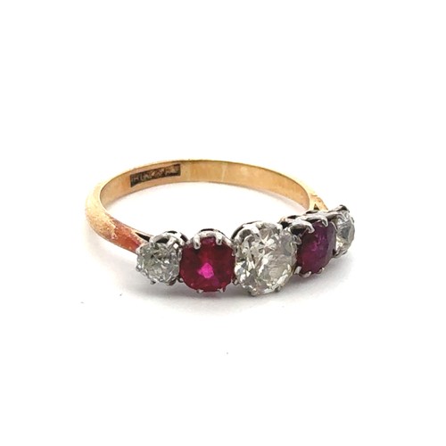 43 - An old cut diamond and ruby five stone ring, size R. 3.90g. Principal diamond 6.1mm, estimated appro... 