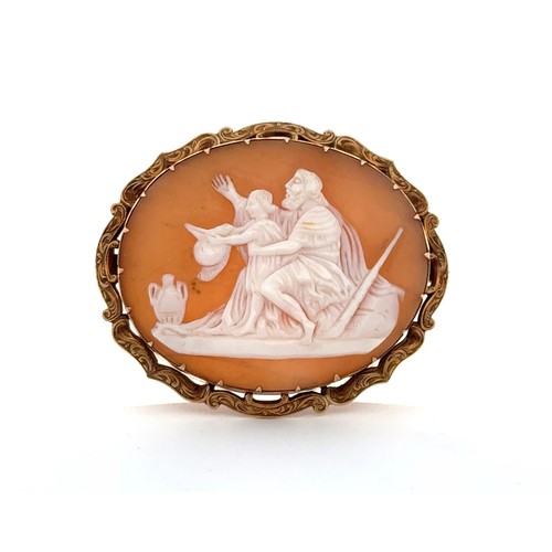 1 - An oval cameo brooch depicting a scene from Greek mythology, in a yellow yellow mount with engraved ... 