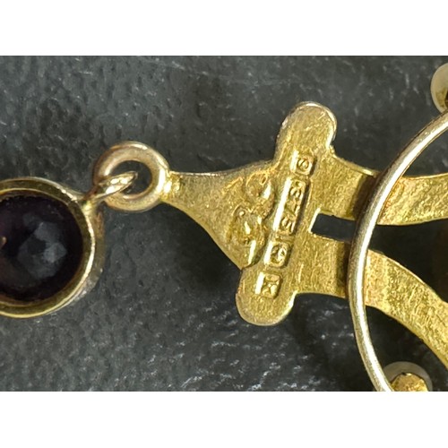 6 - A 9ct gold art nouveau style amethyst and seed pearl pendant. 1.92g. Length approx 38mm.