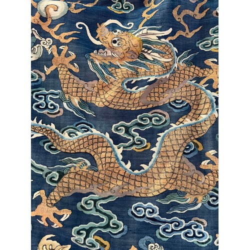 296 - Chinese Late 19th / Early 20th Century silk blue ground Dragon robe with gold thread. Finely embroid... 