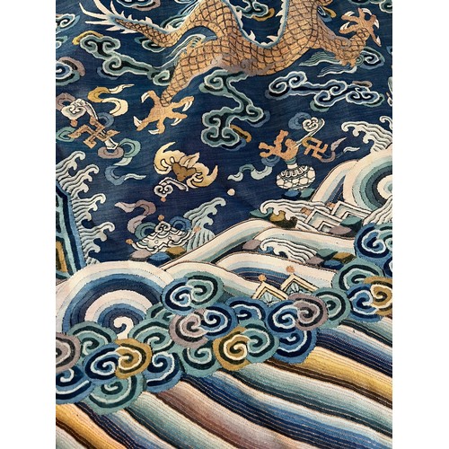 296 - Chinese Late 19th / Early 20th Century silk blue ground Dragon robe with gold thread. Finely embroid... 