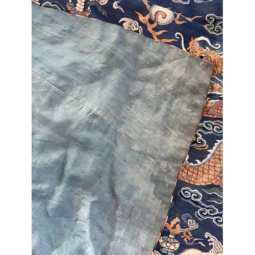 296 - Chinese Late 19th / Early 20th Century silk blue ground Dragon robe with gold thread. Finely embroid... 