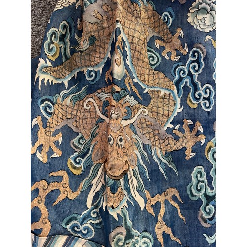 296 - Chinese Late 19th / Early 20th Century silk blue ground Dragon robe with gold thread. Finely embroid... 