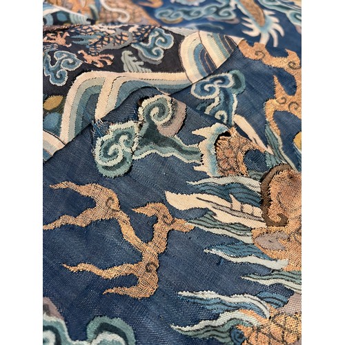 296 - Chinese Late 19th / Early 20th Century silk blue ground Dragon robe with gold thread. Finely embroid... 