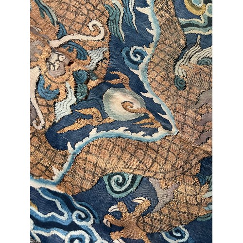 296 - Chinese Late 19th / Early 20th Century silk blue ground Dragon robe with gold thread. Finely embroid... 