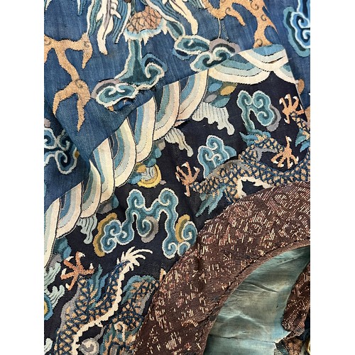 296 - Chinese Late 19th / Early 20th Century silk blue ground Dragon robe with gold thread. Finely embroid... 