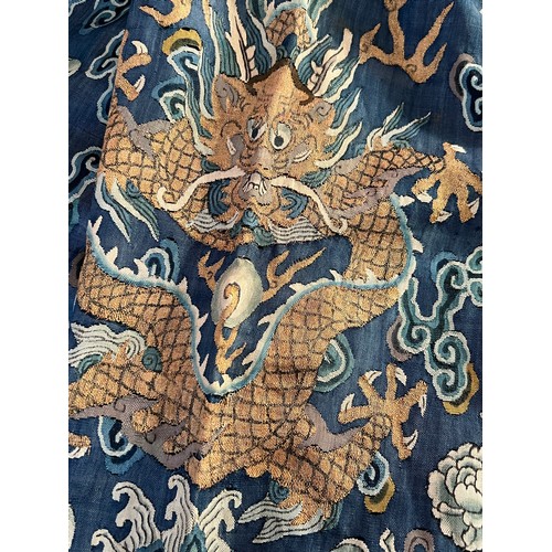 296 - Chinese Late 19th / Early 20th Century silk blue ground Dragon robe with gold thread. Finely embroid... 