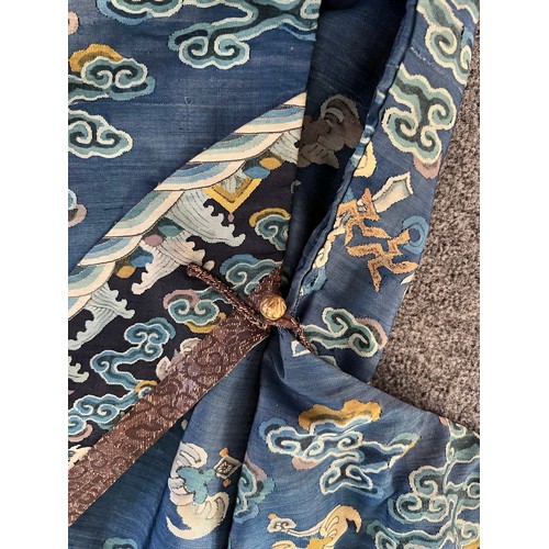 296 - Chinese Late 19th / Early 20th Century silk blue ground Dragon robe with gold thread. Finely embroid... 