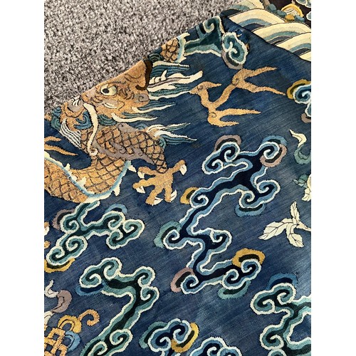 296 - Chinese Late 19th / Early 20th Century silk blue ground Dragon robe with gold thread. Finely embroid... 