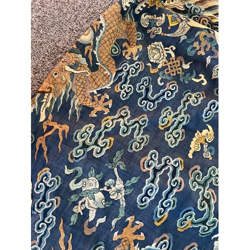 296 - Chinese Late 19th / Early 20th Century silk blue ground Dragon robe with gold thread. Finely embroid... 