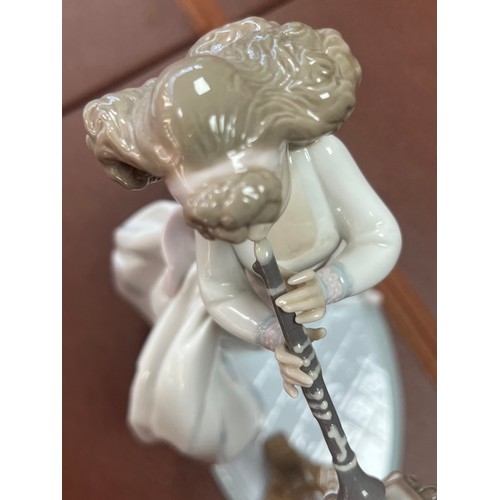 238 - Lladro, four medium Lladro figures to include; Beautiful Rhapsody 6319, Golfer, Happy Anniversary 64... 