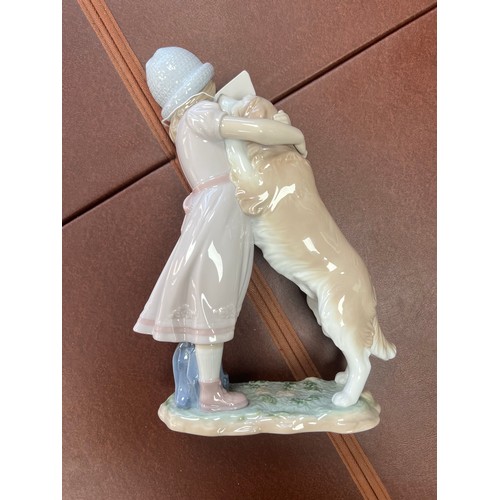 240 - Lladro, A Warm Welcome 6903 figurine. Height 25cm.