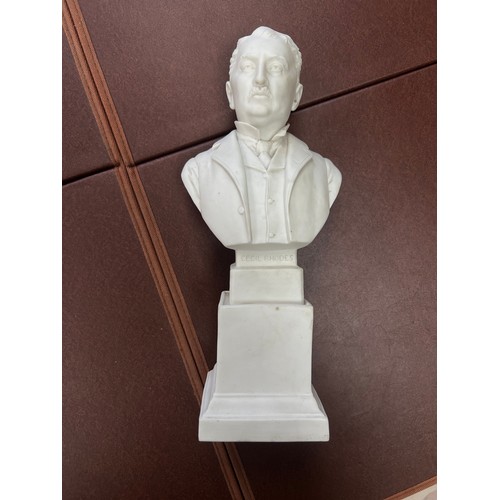 258 - A Robinson and Leadbetter Parian bust of Cecil Rhodes. Stamped to reverse for R&L. Height 29cm.