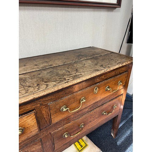 443 - Late 18th / Early 19th Century oak five drawer dresser base. Brass fittings, rectangular top split o... 