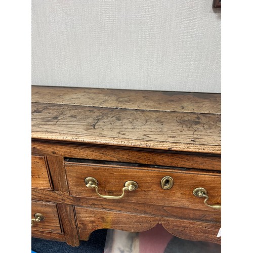 443 - Late 18th / Early 19th Century oak five drawer dresser base. Brass fittings, rectangular top split o... 