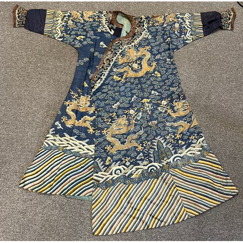 296 - Chinese Late 19th / Early 20th Century silk blue ground Dragon robe with gold thread. Finely embroid... 