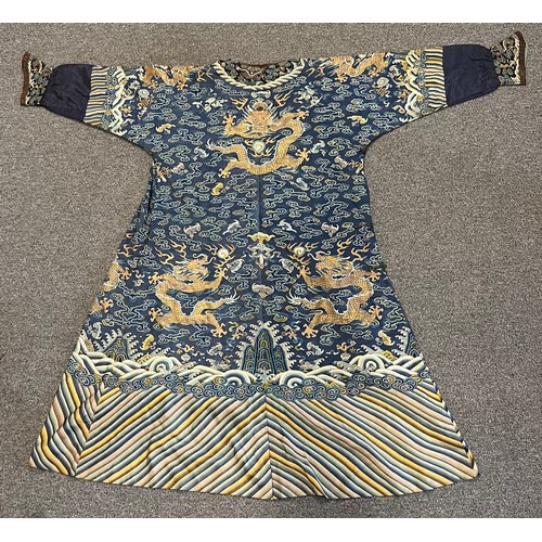 296 - Chinese Late 19th / Early 20th Century silk blue ground Dragon robe with gold thread. Finely embroid... 