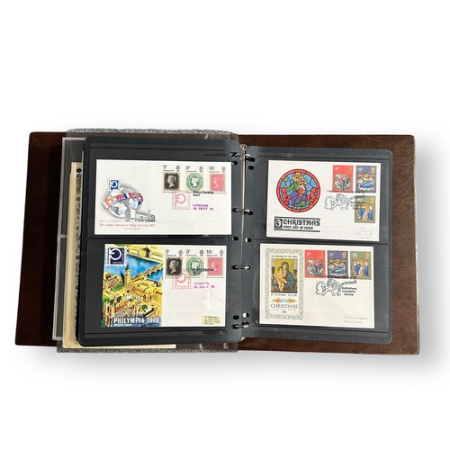 136 - First Day Covers - 1953 to 1970 Xmas, in brown Royal Mail Universal album, nice quality better cover... 