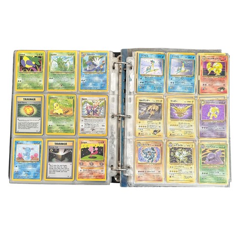 354 - Folder Containing Base set, Jungle, Fossil Pokemon Cards. Including early Japanese Pocket Monster ca... 