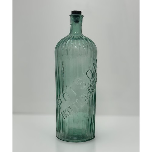 396 - Large Victorian aqua glass poison bottle, ribbed and inscribed at 45% across bottle 'POISON NOT TO B... 