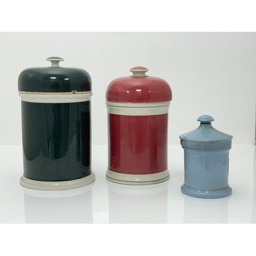 398 - Three Coloured Apothecary Jars: Largest, Dome topped Olive Green, raised ceramic gold foil label ADE... 