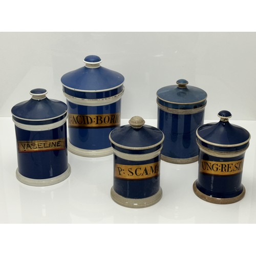 400 - Five Blue And White Apothecary Jars, various sizes: Largest labelled P: ACID BORIC, cracks to lid se... 