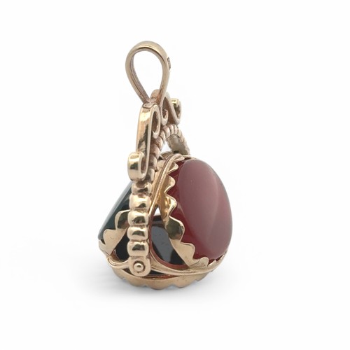 23 - A modern 9ct gold hardstone swivel spinner fob pendant, with bloodstone, carnelian and onyx. 7.52g. ... 