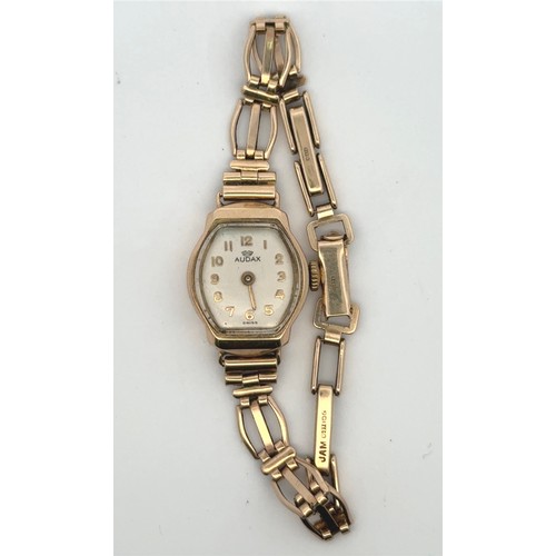 105 - An Audax 9ct gold watch on a 9ct gold bracelet. Gross weight 12.98g. Watch is winding and ticking bu... 