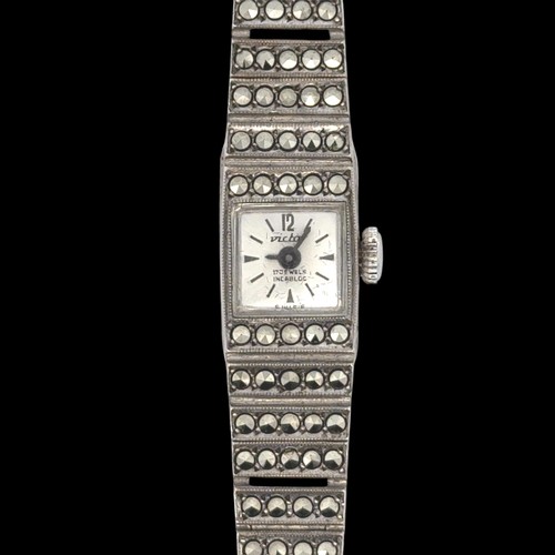 130 - A Victor silver and marcasite ladies cocktail watch stamped 925 to reverse of watch and to bracelet.