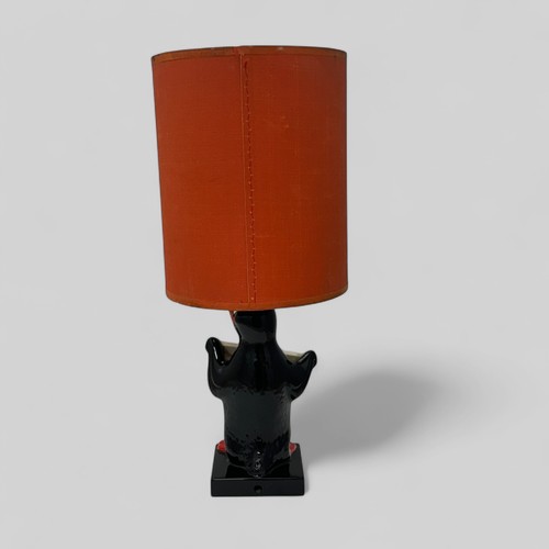 374 - Guinness, Carlton Ware Guinness Penguin Table Lamp modelled as a standing penguin holding a 'Draught... 