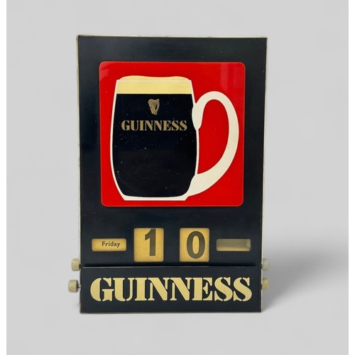 368 - Guinness Perpetual Calendar. Red and black plastic wall calendar showing pint of Guinness. One of th... 