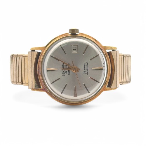 112 - Sekonda: A gold plated and stainless steel gents Sekonda De Luxe automatic wristwatch, date aperture... 