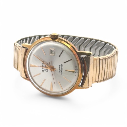 112 - Sekonda: A gold plated and stainless steel gents Sekonda De Luxe automatic wristwatch, date aperture... 