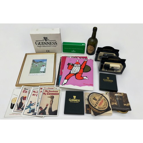 376 - Guinness Memorabilia range to include; Shamrock sun glasses, Guinness Bateman Limited edition Cartoo... 