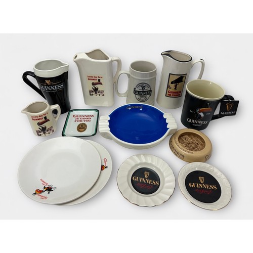 382 - Guinness, selection of Guinness Jugs, Plates and Ash Trays. Includes; four jugs two having Toucan mo... 