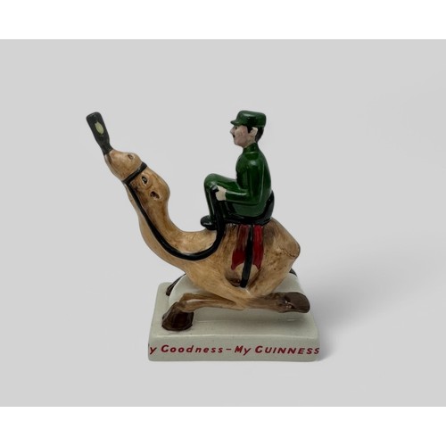 371 - Guinness, a rare hand painted Carlton Ware Guinness Zoo Keeper Riding Camel. Camel is drinking a bot... 