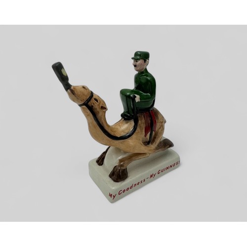 371 - Guinness, a rare hand painted Carlton Ware Guinness Zoo Keeper Riding Camel. Camel is drinking a bot... 