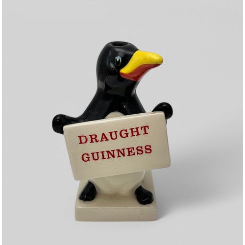 367 - Guinness Carlton Ware Guinness lamp base in the form of a penguin holding sign 