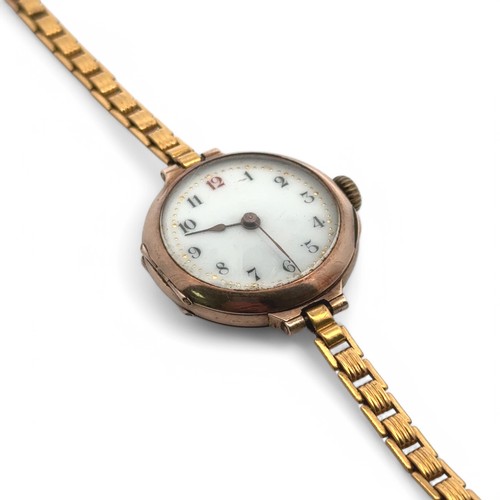 116 - A vintage ladies watch stamped 9ct to inner back plate, on an Aristo yellow metal bracelet. Gross we... 