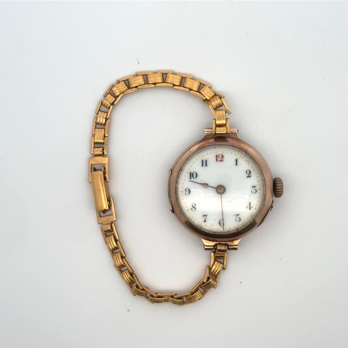 116 - A vintage ladies watch stamped 9ct to inner back plate, on an Aristo yellow metal bracelet. Gross we... 