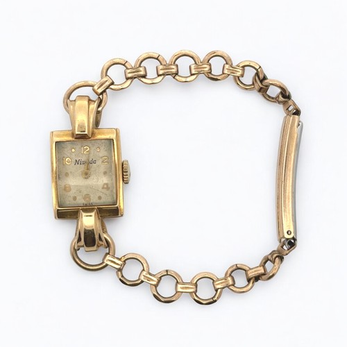 108 - An 18ct gold Nivada ladies gold cocktail watch on a rolled gold bracelet. Gross weight 20.38g