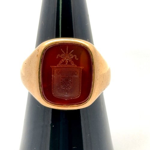 11 - A gold family crest carnelian intaglio ring, stamped 9ct. Size S. Carnelian approx 15mm x 12.5mm. 8.... 