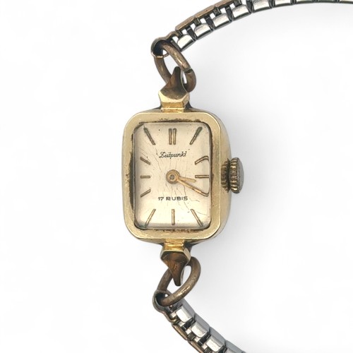 109 - A 14ct gold Leitpunkt ladies 17 jewel watch on a yellow metal and stainless steel bracelet. Gross we... 