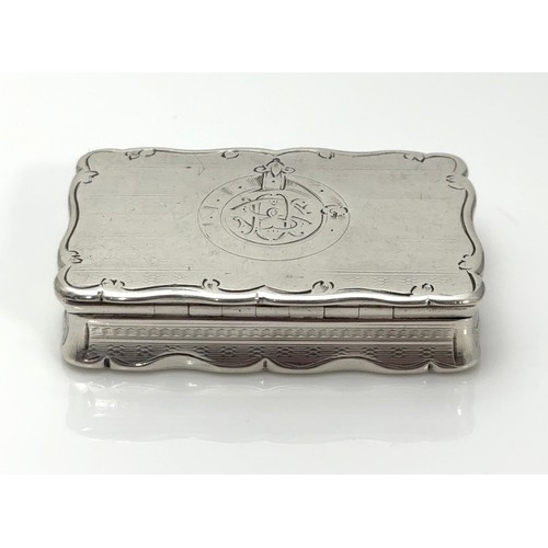 164 - A heavy Victorian silver snuff box with gilt interior by George Unite, Birmingam 1874. Inscribed to ... 