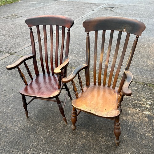 661 - Two Lathe Back Kitchen Chairs. On turned legs with arm rests. Chairs are similar in dimensions. H111... 