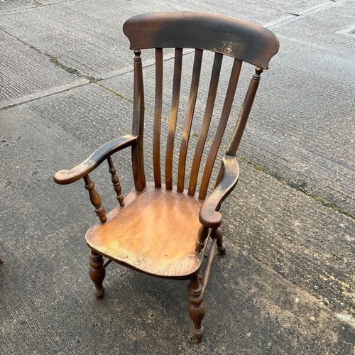 661 - Two Lathe Back Kitchen Chairs. On turned legs with arm rests. Chairs are similar in dimensions. H111... 