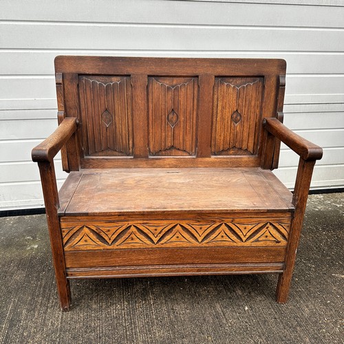 662 - Dark Oak Monks Chest. Can be used as a table or chair. H93cm x W98cm x D47cm. BUYER TO COLLECT OR AR... 